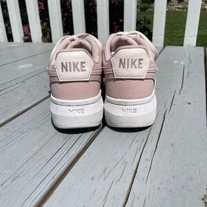 Women’s pink Nike Airforce 1 Platform shoes. Size 9 women’s.